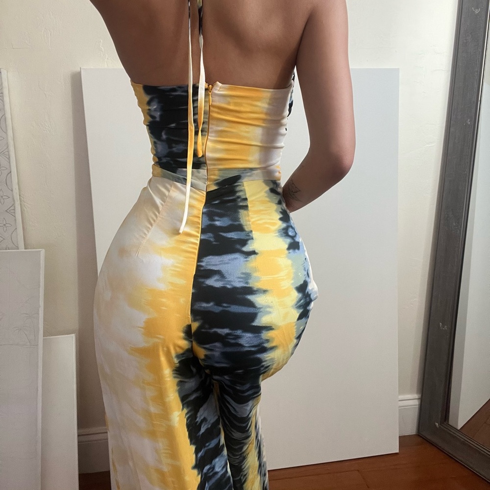 Adjustable JumpSuit. Size Small